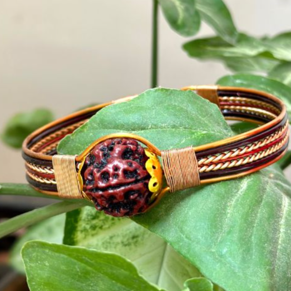 The 7 Mukhi Rudraksha is a sacred bead with seven faces that is said to have many benefits